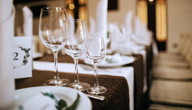 istock Elegant table setting  with wine glasses and plates. Catering 1205785291