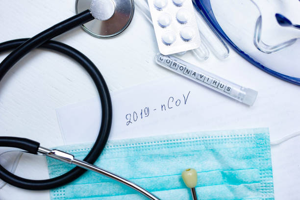 istock test tube with the virus coronavirus. 1205787594