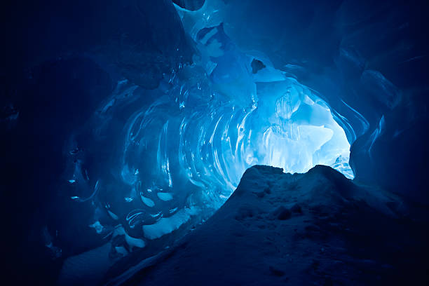 An inside shot of a beautiful blue ice cave stock photo
