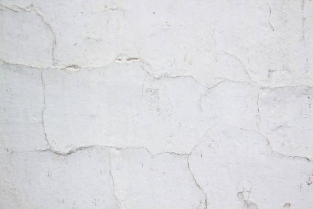 istock Composition with concrete cement wall with crack in industrial building, Will be good for your design and texture background. Old grunge cracked wall for background 1205789206