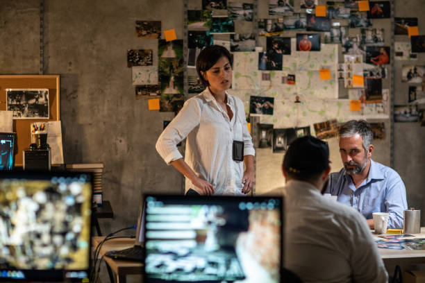istock FBI agents working late at night in the office 1205789425