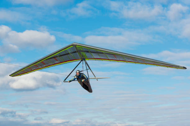 Towing a hang glider. Hang glider take off. 2020-02-09 Byshiv, Ukraine. Towing a hang glider. Hang glider take off. para ascending stock pictures, royalty-free photos & images