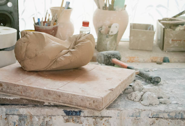 istock Potter's workplace. Old traditional art, handmade, clay and ceramic production. 1205794123