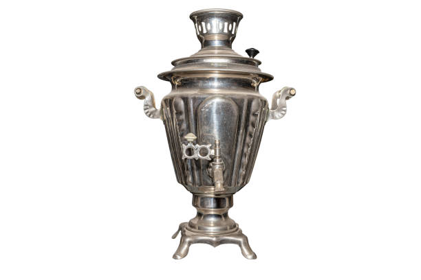 istock A metal samovar made in the old style for preparing tea, isolated on a white background with a clipping path. 1205794846
