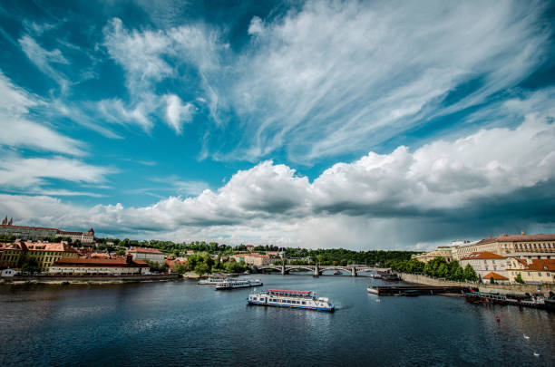 Vltava River And Charles Bridge In The Back In Prague, Czech Republic