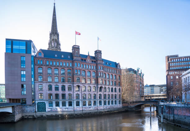 Cityscape with Church of St. Nicholas, Hamburg, Germany Cityscape of Hamburg with famous church of St. Nicholas (Mahnmal St. Nikolai), Germany st nicholas church prague stock pictures, royalty-free photos & images