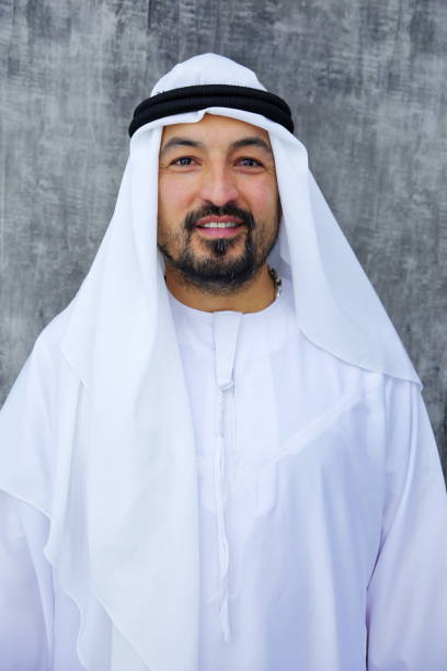 istock Arab businessman standing in office 1205800380