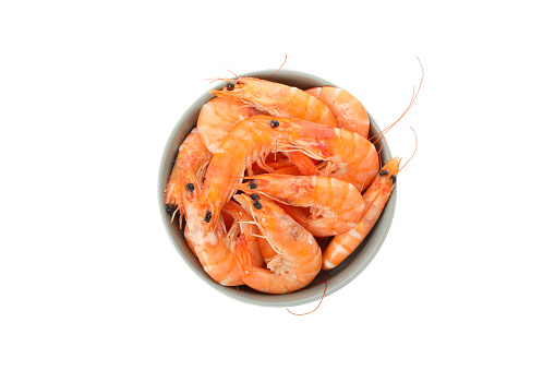 Bowl with shrimps isolated on white background