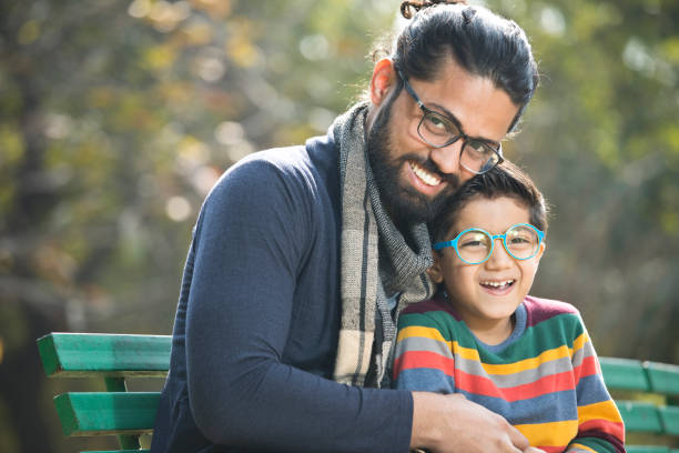 istock Father with son enjoying at park 1205801456