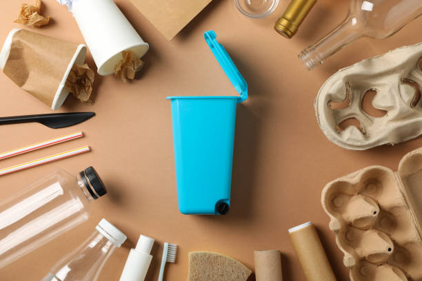 istock Recycle bin and different trash on craft background, top view 1205802295