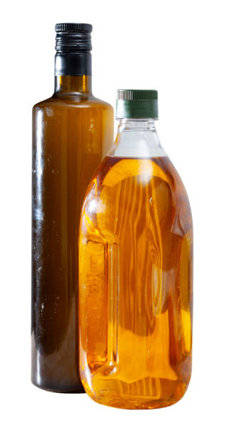 istock Vegetable oil on wooden table 1205802555