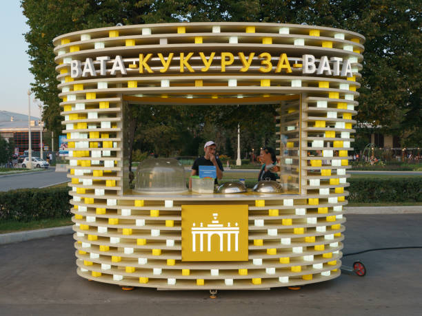 Moscow, Russia - August 25 2018: Fast food with corn in the park. Touristic and lifestyles concenpts.
