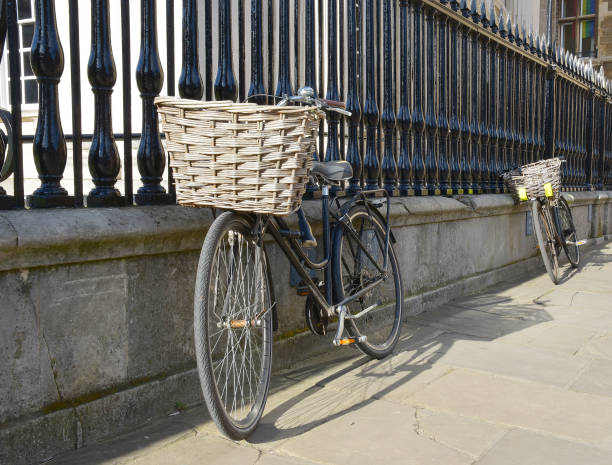 istock Student bicycles resting against railings in Cambridge UK 1205805781