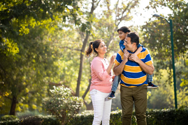 istock Happy family at park 1205807489
