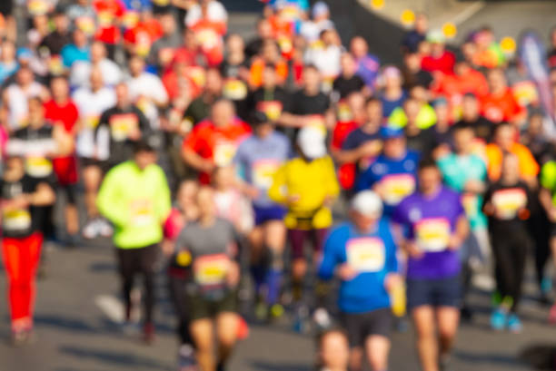 istock Crowd of people running marathon 1205808871