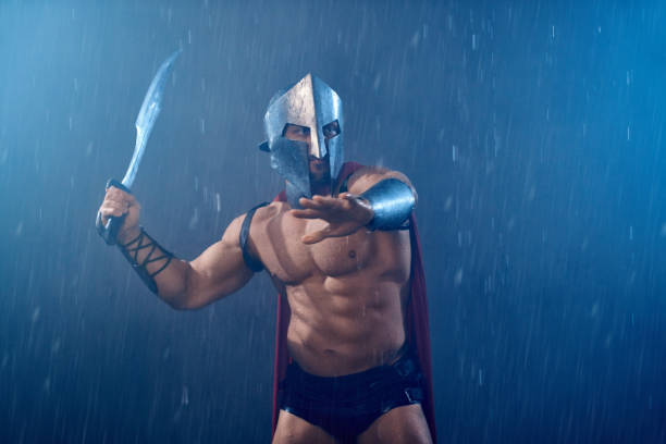 istock Muscular spartan with sword. 1205810587