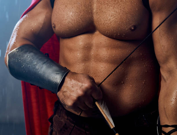 istock Musular body of spartan archer. 1205810716