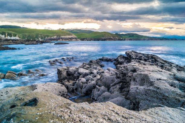 istock South wind sunset and dramatic sky in Ensenada de Tagle, Spain 1205811818
