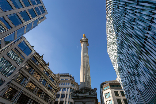 Monument to the Great Fire of London on a sunny winter day.