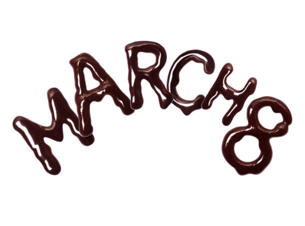 istock Inscription March 8 made of chocolate, isolated on white background 1205818328