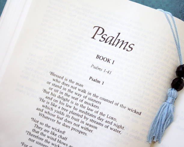 The Book of Psalms opened at Book One Psalm One The Book of Psalms opened at Book One Psalm One psalms stock pictures, royalty-free photos & images