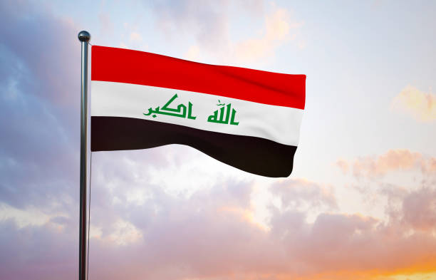 istock Waving Iraq flag at pole over sky 1205824844