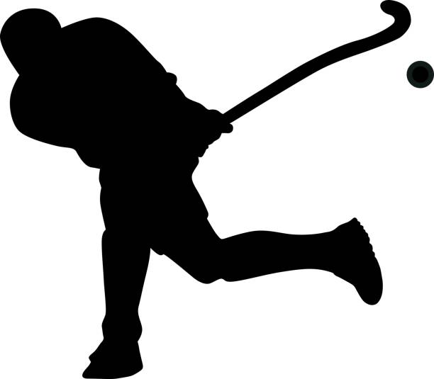 istock Silhouette of field hockey player with a hockey stick 1205827370