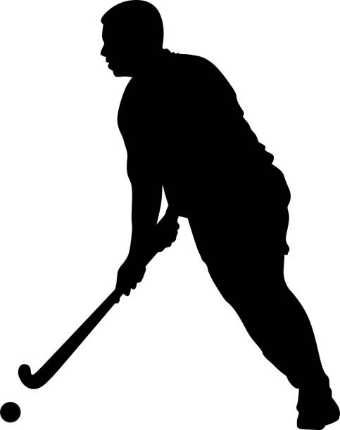 istock Silhouette of field hockey player with a hockey stick 1205827427