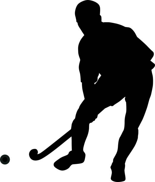 istock Silhouette of field hockey player with a hockey stick 1205827470