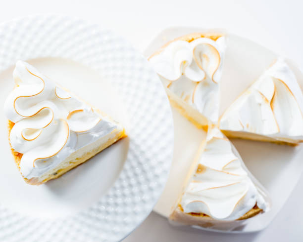 slices of white puff cake with meringue