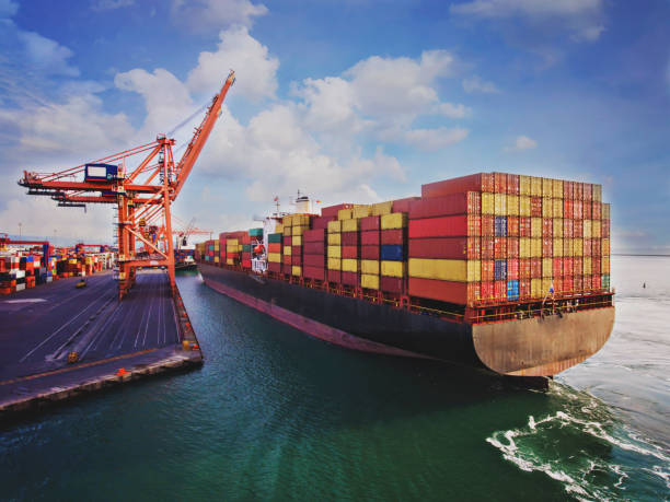 istock Aerial view of cargo ship in transit. 1205829795