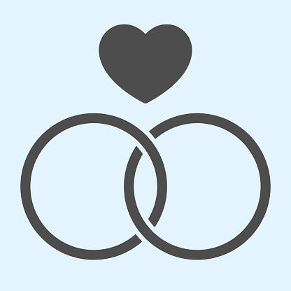 Rings solid icon. Two crossing circles with heart shape. Wedding asset vector design concept, glyph style pictogram on white background, use for web and app. Eps 10