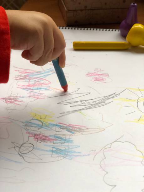 istock little boy painting 1205830165