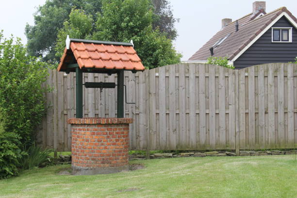 istock a well in the garden in summer 1205832379