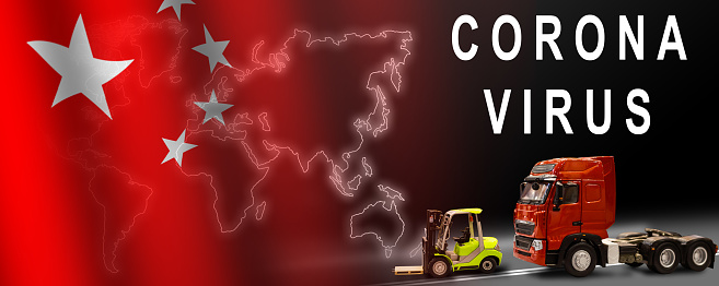 Freight transport with the inscription coronavirus. The concept on the spread of the 2019-vCoV virus during cargo transportation between countries