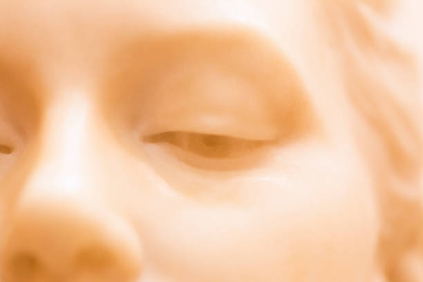 Closeup old marble statue of angel, background with copy space