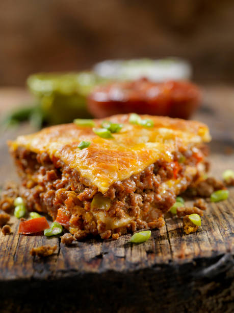 Baked, Layered, Beef Taco Pie with Sour Cream, Salsa and Guacamole