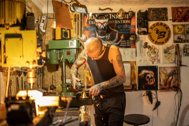 istock Tattoo artist in his working studio 1205838105