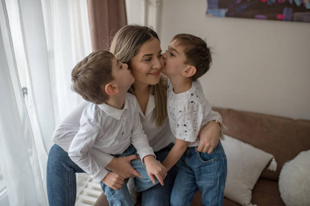 istock mother is spending day with her two sons 1205838401