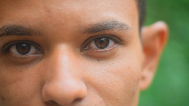 istock Brown eyes of a young man 1205840297