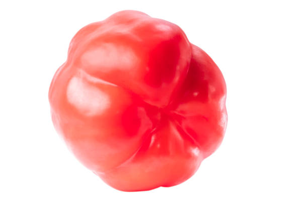 Closeup photo of a red fresh pepper isolated over white background stock photo