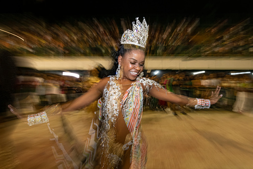 Image with photographic effects of a beautiful Brazilian woman at the rehearsal for the Carnaval parade