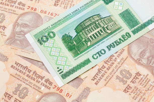 istock A Belorussian one hundred ruble bank note with Indian ten rupee bank notes 1205846861