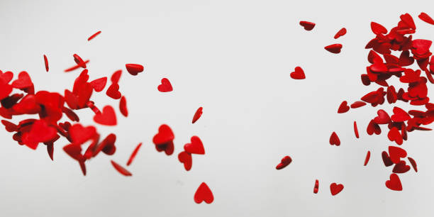 istock Flying red hearts on white background, Soft Focus With Bokeh. Valentines Day Wedding Love Idea 1205846925