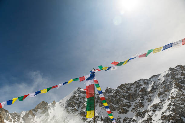 istock buddhist prayer flags and snow covered mountains in the himalaya 1205848867