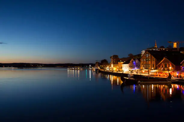 Amazing night shot of city harbour with viking ship, port with r in Tønsberg, Vestfold Og Telemark, Norway