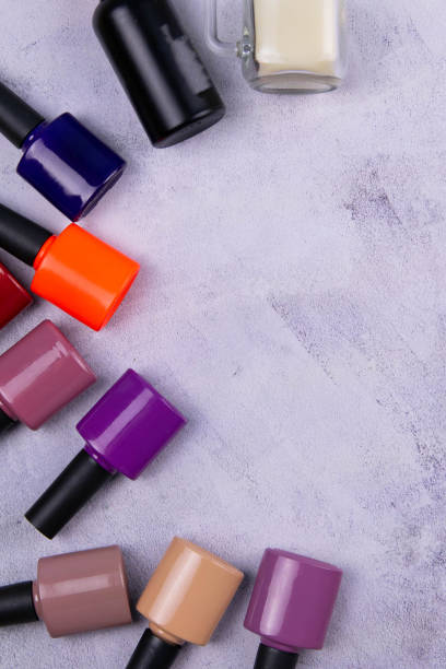 istock Multi-colored gel varnishes on a concrete background 1205849990
