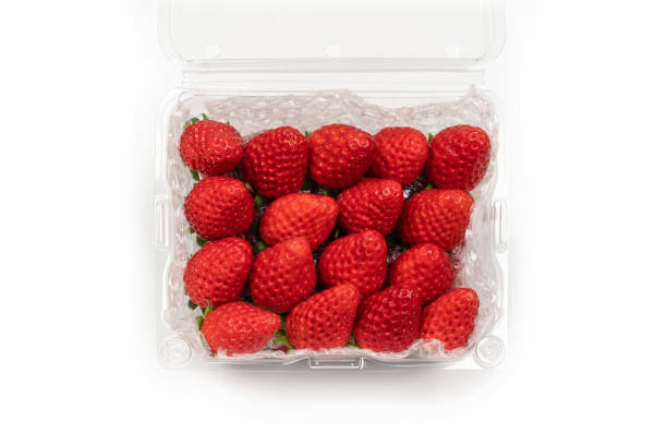 istock Fresh Asia Strawberry are arranged in premium packaging plastic box with bubble pack inside on the white background. Clipping path. 1205851866