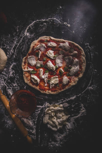 istock Making an Italian pizza at home 1205852622