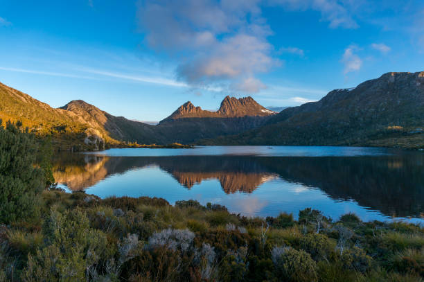 istock Mountains and lake with perfect reflection nature background 1205852745